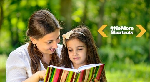 Mother and daughter reading a book